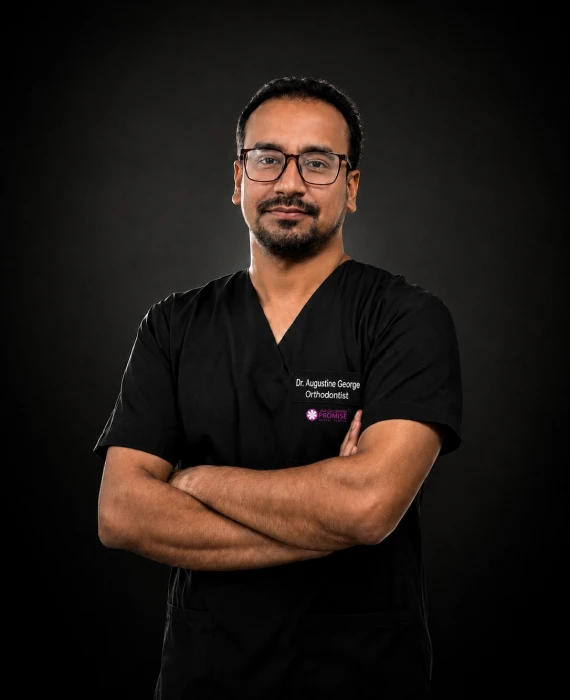 Dr. Augustine George